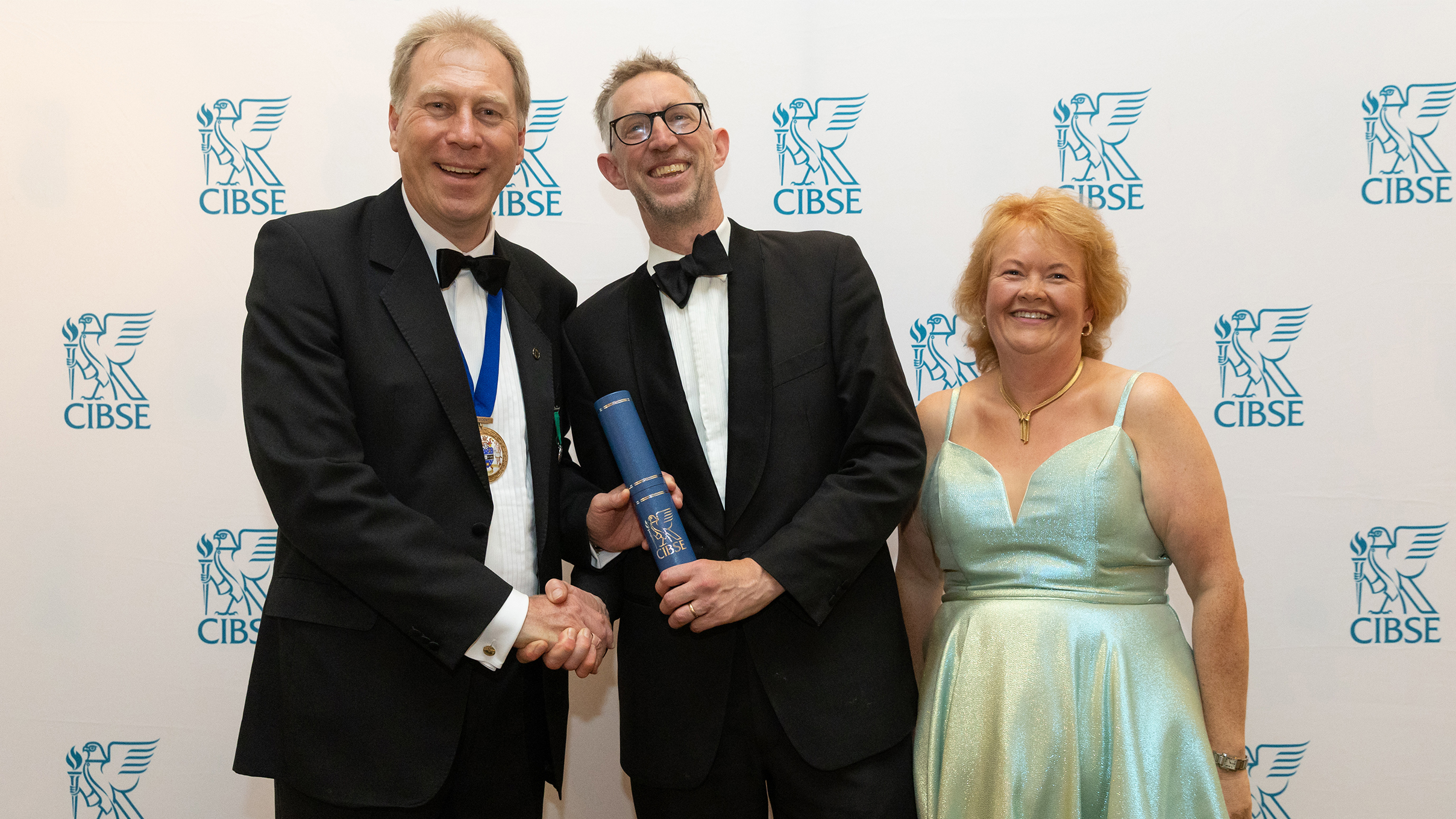 CIBSE President provide Alex Smith commendation. Award photo